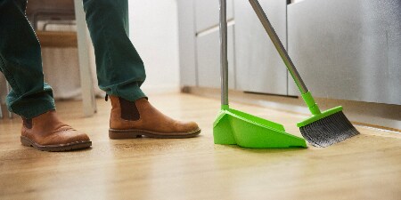 Man sweeping the floor
