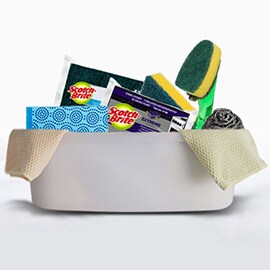 Scotch-brite™ kitchen cleaning tools in a bucket
