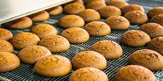 Baked cakes placed on the cooling grates
