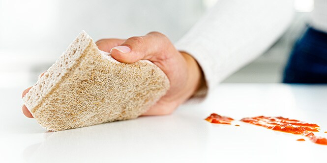 Scotch-Brite® Greener Clean™ Sponge being used in the kitchen
